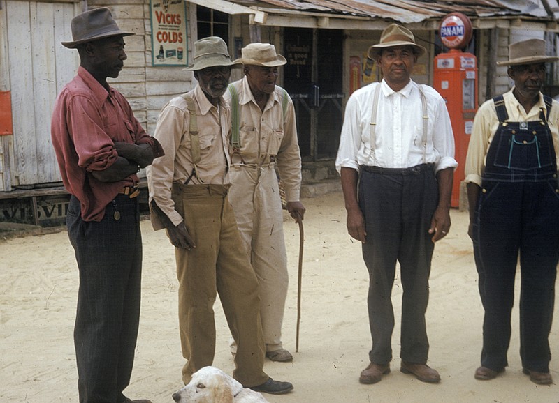 In this 1950's photo released by the National Archives, men included in a syphilis study pose for a photo in Tuskegee, Ala. For 40 years starting in 1932, medical workers in the segregated South withheld treatment for unsuspecting men infected with a sexually transmitted disease simply so doctors could track the ravages of the horrid illness and dissect their bodies afterward. It was finally exposed in 1972. 