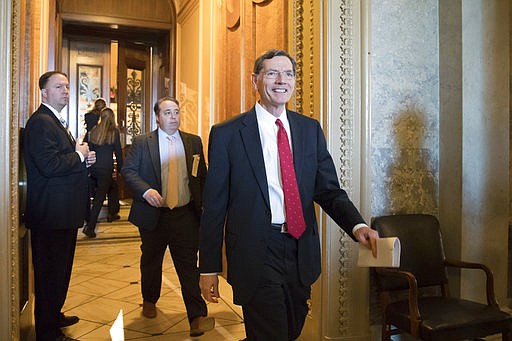Sen. John Barrasso, R-Wyo., chairman of the Senate Environment and Public Works Committee, leaves the chamber following a surprising win for environmentalists and Democrats and a blow to the fossil-fuel industry, as the Republican-led Senate failed in a bid to reverse an Obama-era regulation restricting harmful methane emissions that escape from oil and gas wells on federal land, at the Capitol in Washington, Wednesday, May 10, 2017. 
