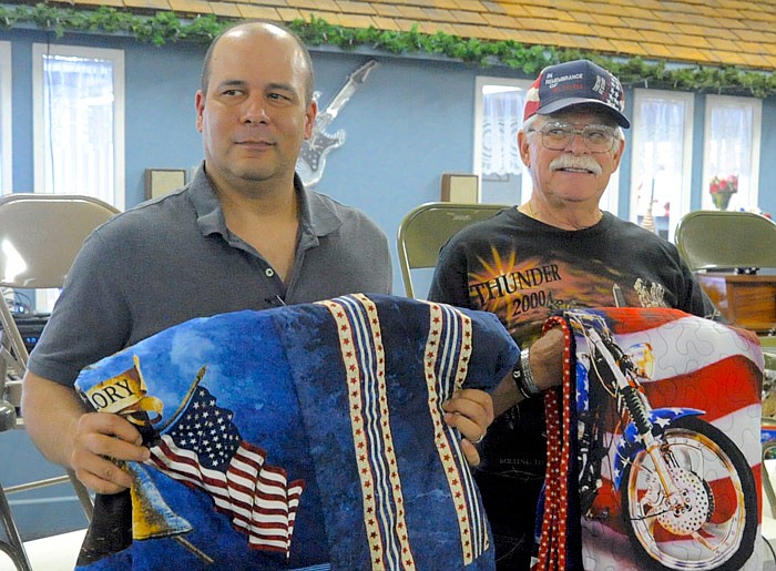 Son and father, James Pingleton and Charlie Pingleton were honored with Quilts of Valor.