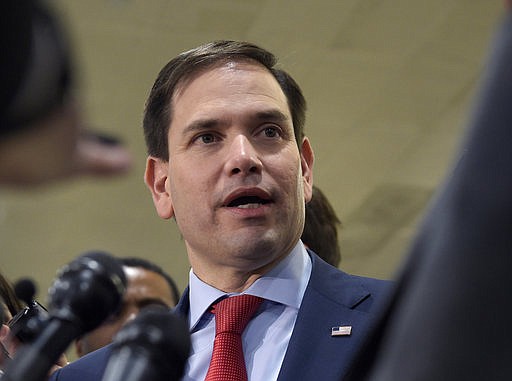 In this April 7, 2017, file photo, Sen. Marco Rubio, R-Fla., speaks to reporters on Capitol Hill in Washington. Congressional Republicans and Democrats have reached agreement on a bill to make it easier for the Department of Veterans Affairs to fire its employees. It's part of an accountability effort touted by President Donald Trump. The measure led by Rubio softens portions of a bill that passed the House in March. Democrats had criticized that bill as unfairly harsh on workers. 