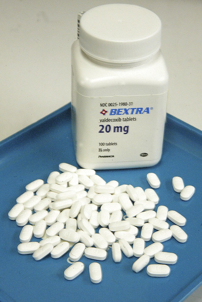 This Thursday, April 8, 2005 file photo shows a bottle of Bextra at a drugstore in New York. Almost one-third of new drugs approved by FDA from 2001-2010, ended up years later with warnings about unexpected, sometimes life-threatening side effects or complications, suggested by an analysis published Tuesday, May 9, 2017, in the Journal of the American Medical Association. The painkiller Bextra was taken off the market in 2005 because of an increased risk of heart problems.