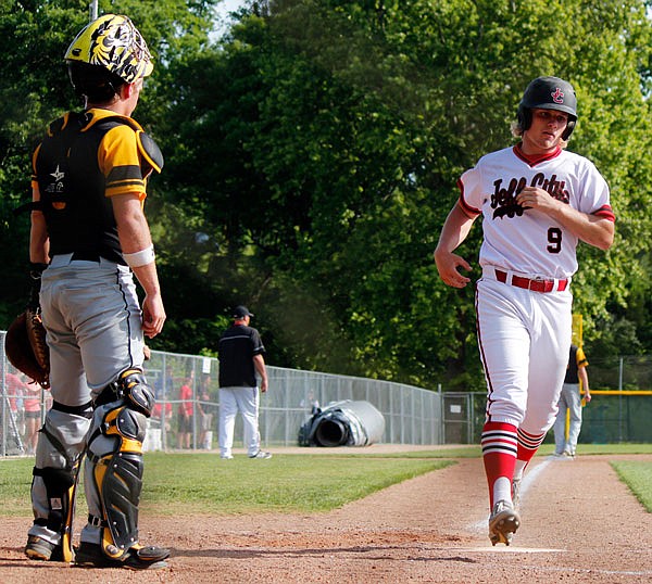 Jefferson City's Kade Franks crosses the plate during the Jays' 10-0 win Monday against Sedalia Smith-Cotton in the Class 5 District 9 semifinals at Vivion Field.