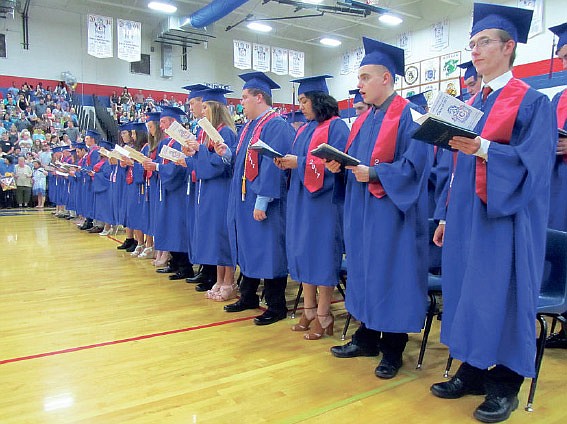 The California High School graduating class of 2017 sings "Alma Mater" during 
their graduation ceremonies on Sunday, May 14, 2017.