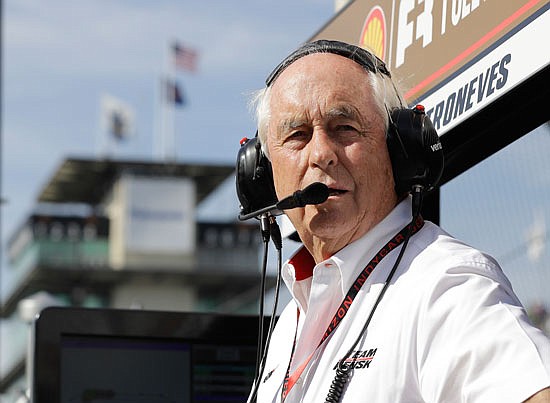 Roger Penske watches practice Tuesday at Indianapolis.