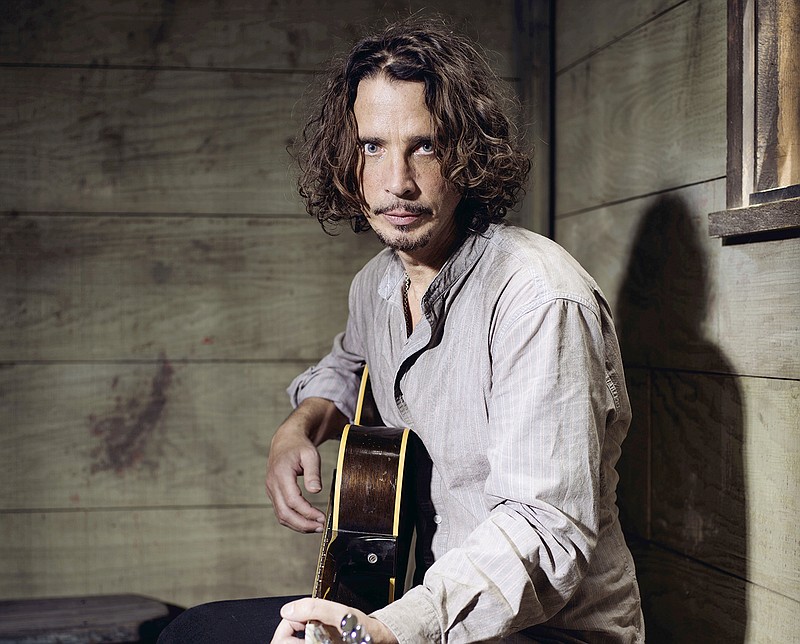 Chris Cornell plays guitar in July 2015 during a portrait session at The Paramount Ranch in Agoura Hills, California. Cornell, 52, who gained fame as the lead singer of the bands Soundgarden and Audioslave, died at a hotel in Detroit, and police said Thursday that his death is being investigated as a possible suicide.