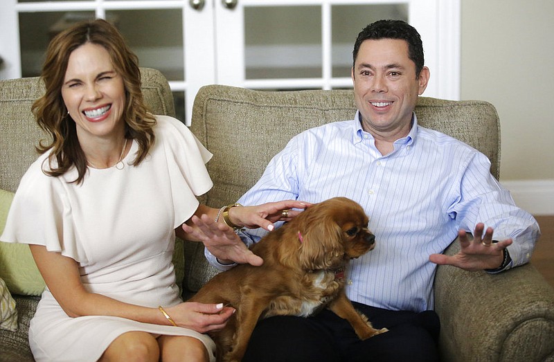 U.S. Rep. Jason Chaffetz and his wife Julie speak with reporters at their home Thursday, May 18, 2017, in Alpine, Utah. Rep. Jason Chaffetz said Thursday that he will resign from Congress next month, a move that calls into question the future of the House Oversight Committee's investigation he promised to lead about President Donald Trump's firing of the FBI director and his presidential campaign's ties with Russia. 