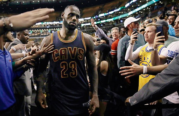 LeBron James of the Cavaliers leaves the court after Wednesday night's 117-104 win against the Celtics ub Game 1 of the Eastern Conference finals in Boston.