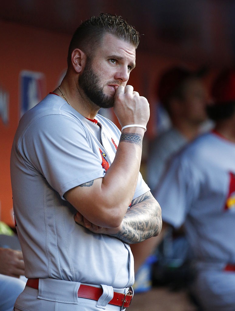 St. Louis Cardinals' Matt Adams looks out of the dugout May 8, 2017 before the start of a baseball game against the Miami Marlins. The Atlanta Braves acquired the first baseman from St. Louis on Saturday, May 20.
