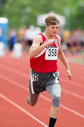 Luke Allen of Calvary Lutheran eyes the finish line in a heat of the Class 1 boys 100-meter dash Friday at the Class 1 state track and field championships at Adkins Stadium.