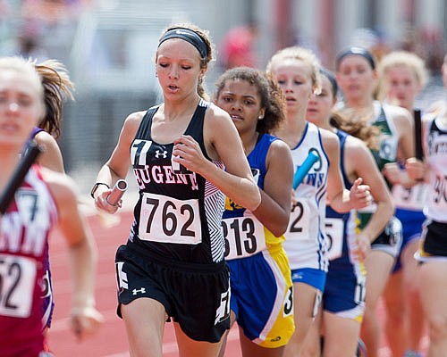 Nicole Koetting of Eugene run a leg of the 4x800-meter relay Friday, May 19, 2017 in the Class 2 girls state track and field championships at Adkins Stadium in Jefferson City. Eugene finished third in the event.