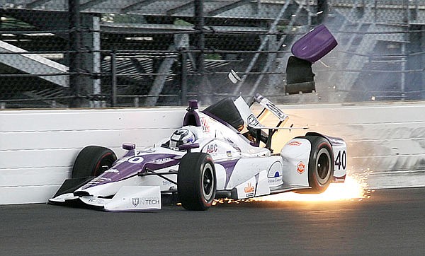 Zach Veach hits the wall during a practice session Friday at Indianapolis Motor Speedway in Indianapolis.