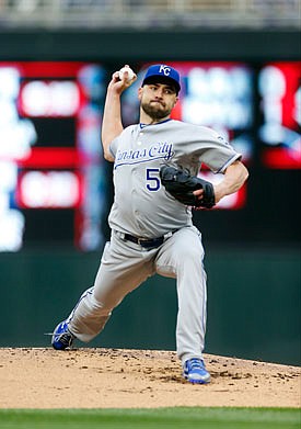 Royals starter Nathan Karns works to the plate during Friday night's game against the Twins in Minneapolis.