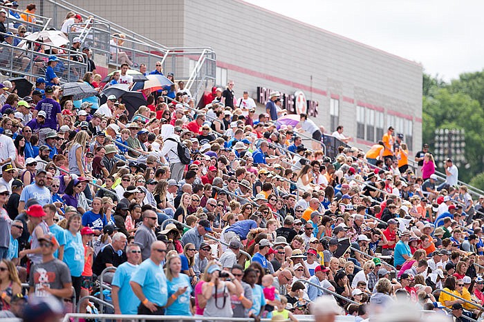Spectators fill the stands at Adkins Stadium on Friday for the first weekend of the Missouri state track and field championships.