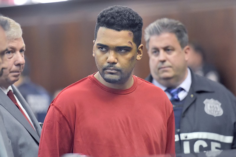 Richard Rojas, of the Bronx, New York, appears Friday during his arraignment in Manhattan Criminal Court in New York. Rojas is accused of mowing down a crowd of Times Square pedestrians with his car on Thursday.