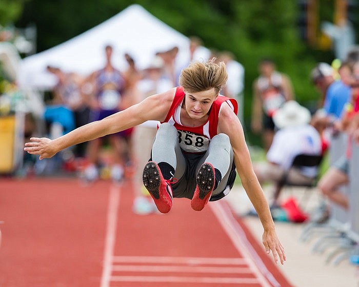 
Luke Allen of Calvary Lutheran flies through the air on his way to winning the state title in the Class 1 boys long jump Saturday, May 20, 2017 at Adkins Stadium in Jefferson City.