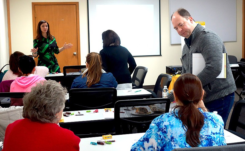 Kellie Pontius, left, of Central Missouri Community Action holds a discussion at a Community Conversation in February 2017. Now, CMCA is holding focus groups to address the needs identified during the conversations.