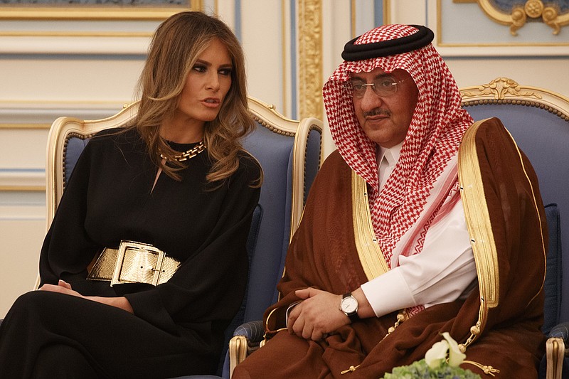 First lady Melania Trump talks with Saudi Crown Prince Muhammad bin Nayef during a ceremony to present The Collar of Abdulaziz Al Saud Medal to President Donald Trump on Saturday, May 20, 2017, at the Royal Court Palace in Riyadh.