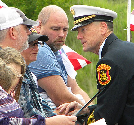 Missouri Fire Marshal J. Tim Bean presents personal proclamations to families which lost a loved one in the line of duty.