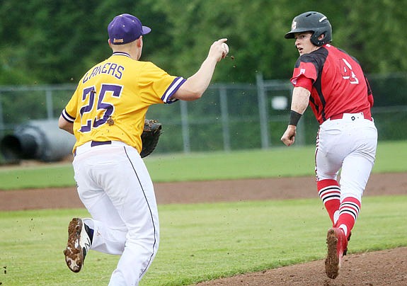 Tyler Bise of the Jays gets in a rundown during a game against Camdenton earlier this season at Vivion Field. 