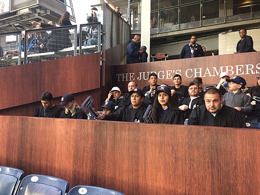 Fans sit in the rooting section Monday night for Yankees rookie Aaron Judge at Yankee Stadium. Looking like a jury box and known as The Judge's Chambers, the section is just behind where Judge plays right field.