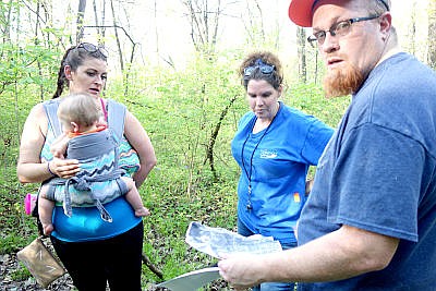 Kimmy Bodle, left, coordinates a search for Carl DeBrodie in April 2017. Bodle is ready to launch her own search-and-rescue team, the Missouri Search and Rescue Ground Team. Fellow searcher Jeremy Cameron, right, will also join the team.