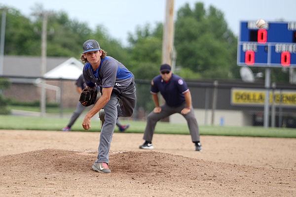 Russellville pitcher Austin Roe delivers to the plate during the fourth inning of Monday's Class 2 sectional game against the Linn Wildcats in Russellville. Roe pitched a five-hit shutout, leading the Indians to a 3-0 win.