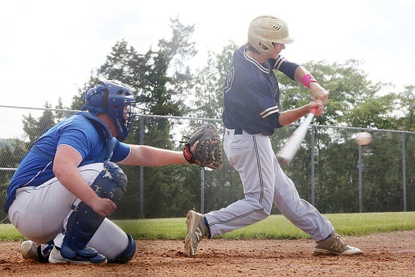 Trevor Austin of Helias makes contact during Tuesday night's Class 4 sectional game with Bolivar at the American Legion Post 5 Sports Complex.