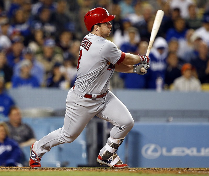 St. Louis Cardinals' Jedd Gyorko singles to left field, two runs score on an error by Los Angeles Dodgers left fielder Cody Bellinger during the fifth inning of a baseball game in Los Angeles, Wednesday, May 24, 2017.