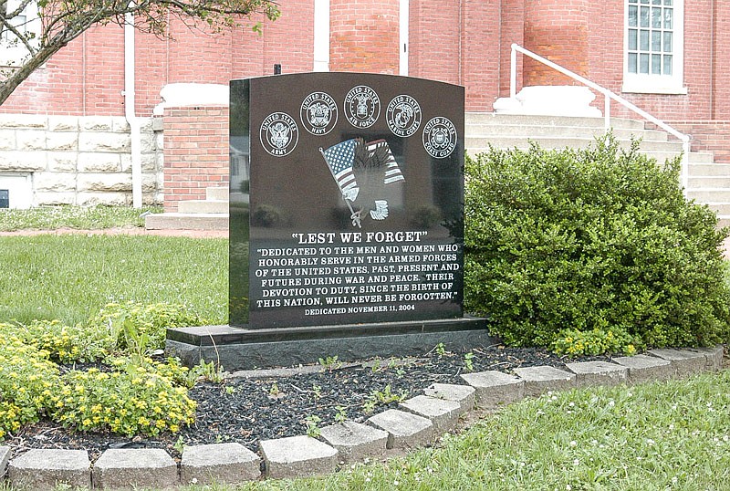 The monument on the south side of the Moniteau County Courthouse is dedicated to veterans, "Lest We Forget."