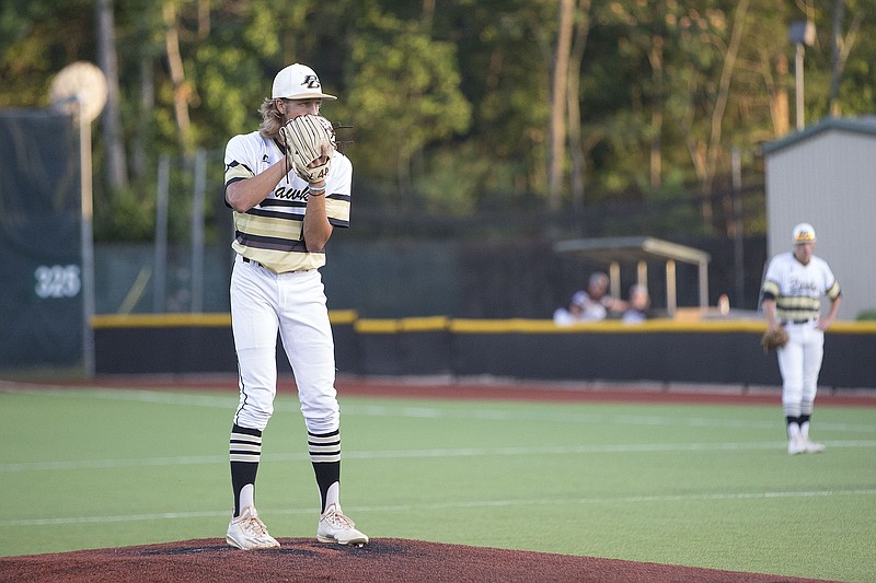 Pleasant Grove pitcher Caleb Bolden waits for the signal from catcher Keaton Russo during Game 1 of the Region II-4A semifinal against Argyle at Mike Carter Field in Tyler, Texas. 