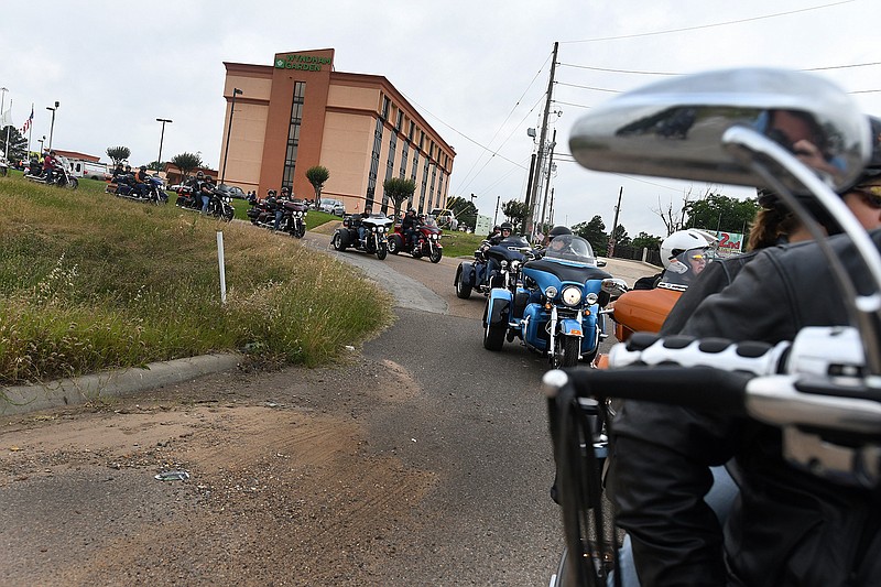 Between 125 and 150 motorcycles leave the Wyndham Garden Hotel early Friday on State Line Avenue. The ride is part of a three-day motorcycle rally benefiting St. Jude Children's Hospital for Memorial Day weekend. 