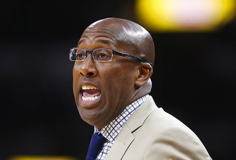 In this Saturday, May 20, 2017, file photo, acting Golden State Warriors coach Mike Brown gives out instruction during the first half in Game 3 of the NBA basketball Western Conference finals in San Antonio. 