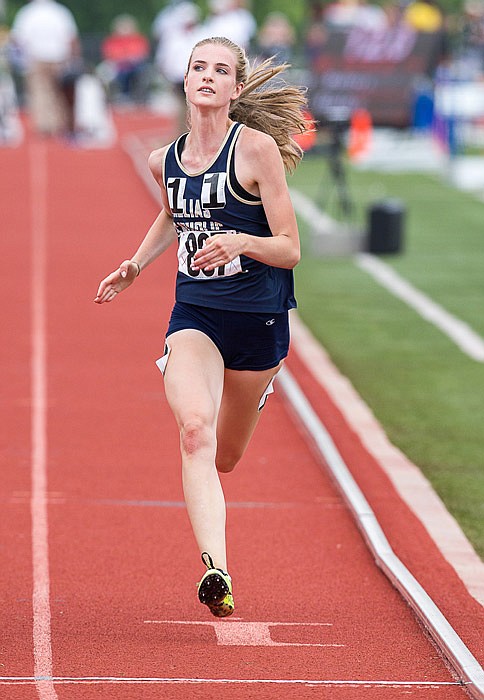 
Anna Vollet of Helias eyes the finish of the Class 4 girls 100-meter dash Saturday at Adkins Stadium.