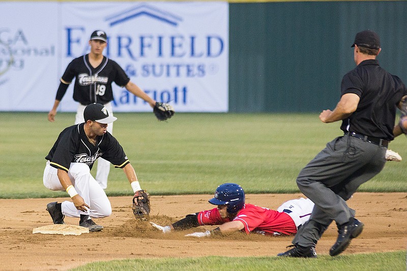 The Texarkana Twins' Conner Anderson tags out the Victoria Generals' Cam Boudreaux on Saturday at George Dobson Field.