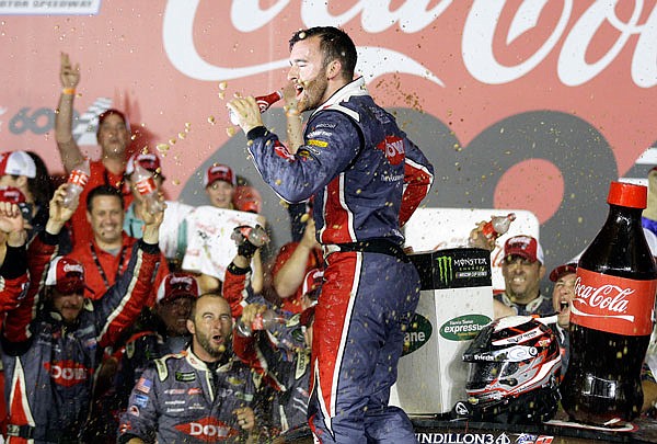 Austin Dillon celebrates in victory lane after winning the NASCAR Cup series at Charlotte Motor Speedway in Concord, N.C.