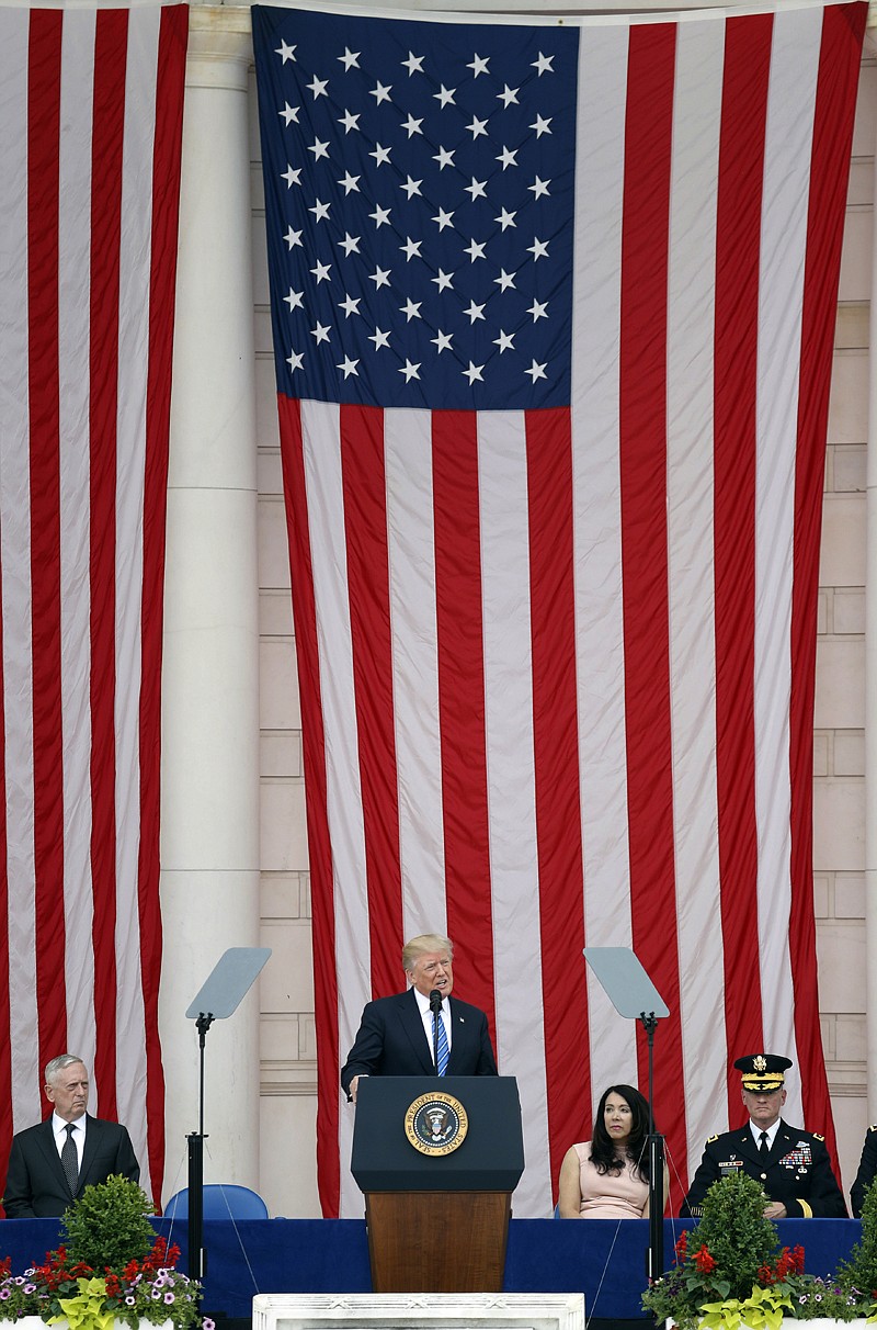 President Donald Trump speaks Monday at the Memorial Amphitheater in Arlington National Cemetery in Arlington, Va., during Memorial Day ceremonies.