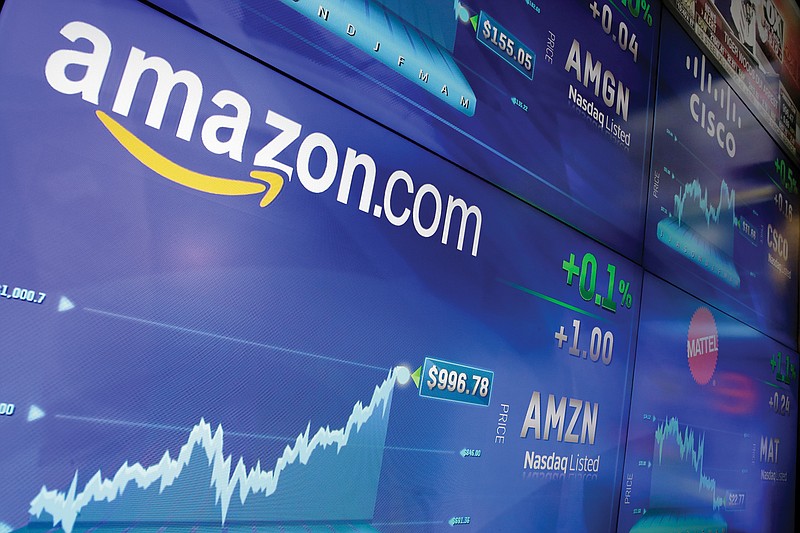 The Amazon logo is displayed at the Nasdaq MarketSite, in New York's Times Square, Tuesday, May 30, 2017. Online retail giant Amazon.com traded above $1,000 a share for the first time. 