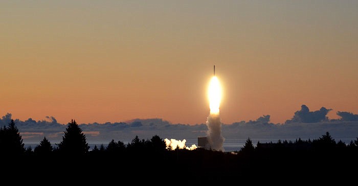 A Minotaur IV rocket takes off from Kodiak Launch Complex on Kodiak Island, Alaska. The rocket was carrying an experimental Navy satellite designed to provide safer combat communications. Today, Alaska Aerospace has rebuilt its launch site after a rocket exploded after takeoff in 2014 and is again showing signs of liftoff.