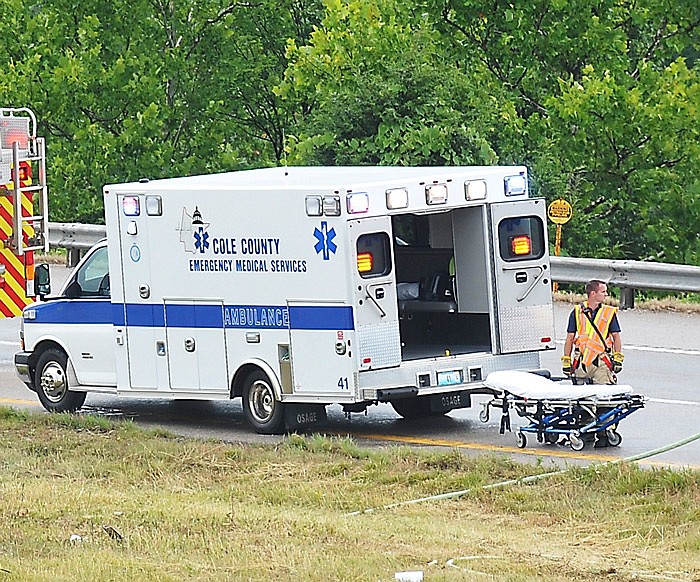 In this June 30, 2016 file photo, an Cole County Emergency Medical Services (EMS) ambulance stands by at the scene of a vehicle crash.