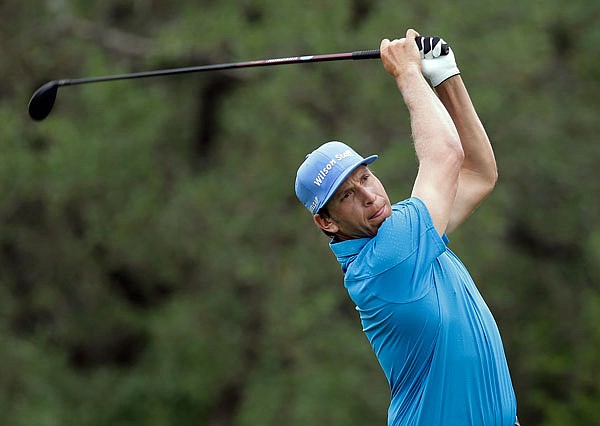 In this Sunday, April 24, 2016, file photo, Ricky Barnes hits his drive off on the first hole during the final round of the Texas Open in San Antonio. Barnes chose not to enter U.S. Open qualifying this year because his priority is on keeping his PGA Tour card.