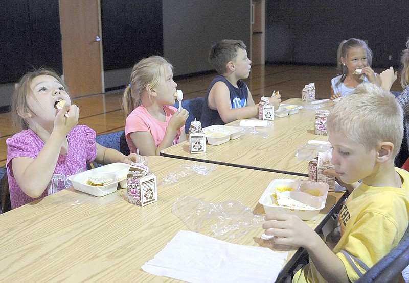 Children from California Kids Day Care ate Monday at the first lunch using the USDA's Summer Food Service Program. The program is available to all children 18 and younger 11:30 a.m.-noon Monday-Thursday at First Baptist Church in California.