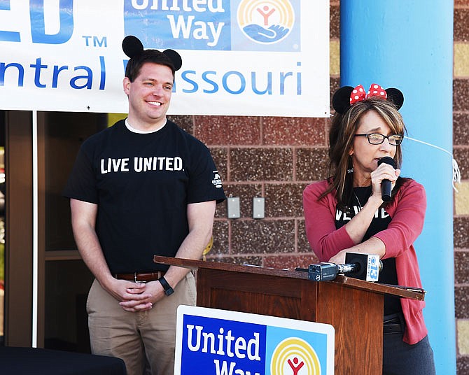 Donning Mickey Mouse ears, United Way campaign co-chairs Ryan Freeman and Jayne Dunkmann announce this year's campaign goal and theme Tuesday during a news conference at the new Boys & Girls Club facility at 1105 Lafayette St. 