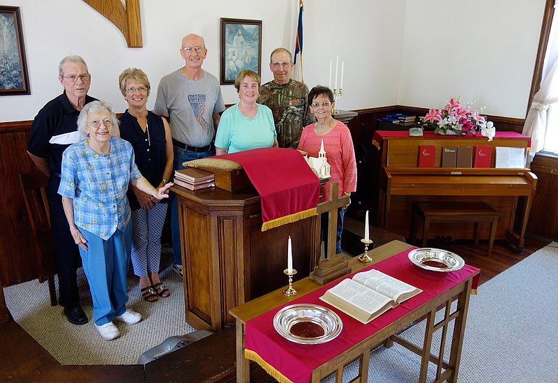 Some of the last church members at Mount Carmel Methodist Church include, from left, Leroy and Frieda Hamilton, Cindy Atkinson, Dean and Leona Powell, Steve Swaim and Patricia Gibbs. Founded in 1876 and built the next year, the church will have its final event, its 140th anniversary celebration, on June 25, 2017.