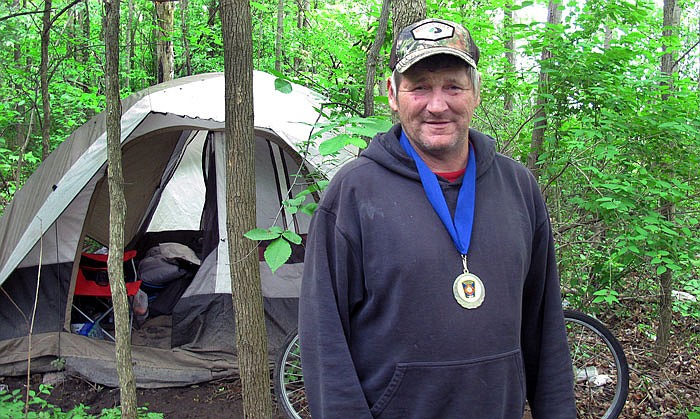 James Pocock was honored by  Williston, Vermont, officials after he helped save the life of a truck driver whose vehicle crashed after suffering a heart attack near Pocock's home in the woods. 