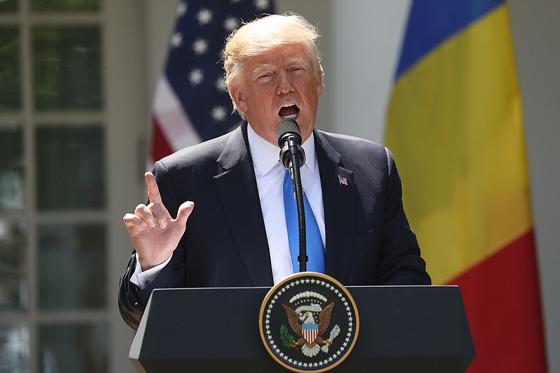 President Donald Trump speaks during a news conference with Romanian President Klaus Werner Iohannis, in the Rose Garden at the White House, Friday, June 9, 2017, in Washington.  Donald Trump is trying to change the subject from scandal back to his promise to make American job creation a top priority. "We want to get back to running our great country," Trump said Friday at a White House news conference. 