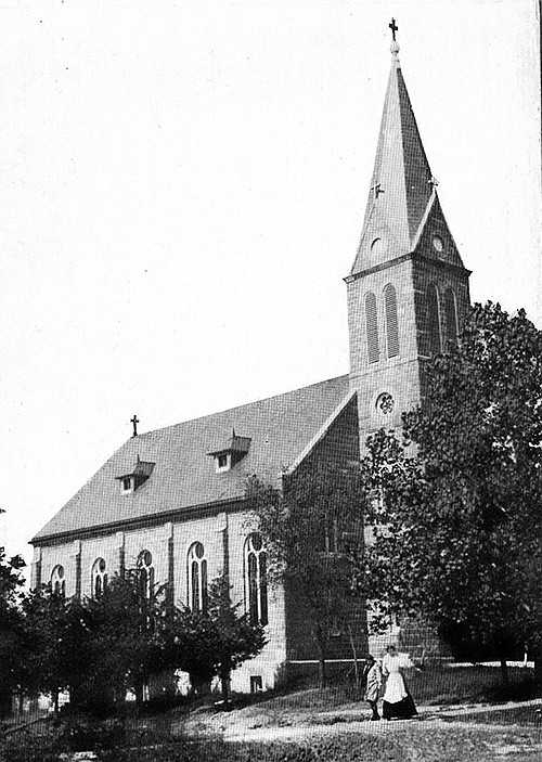 This photograph represents the Visitation Interparish School circa 1895. The Rev. Henry Kuennen was the priest, and a Mr. Koerber was the school teacher.