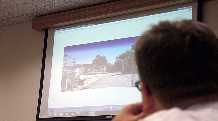 City Counselor Ryan Moehlman observes a virtual tour of some of the land that is going to be redeveloped around the Missouri State Penitentiary during a Jefferson City Council meeting Monday, June 12, 2017.