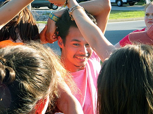 William Woods University Freshman Advantage student León Brown, center, participates in a team building exercises Monday night.