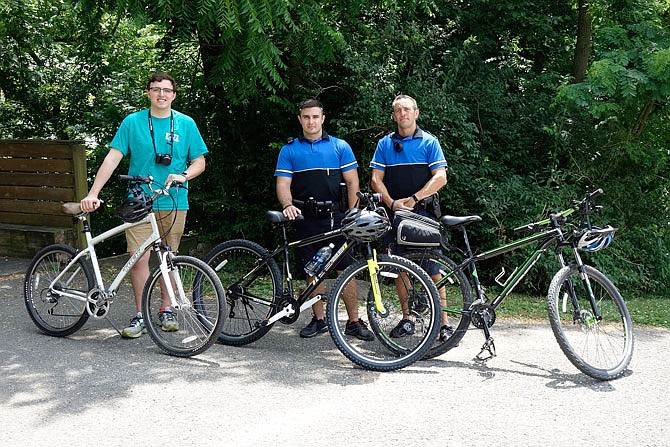 Fulton Sun reporter Connor Pearson, left, joins Fulton Police Department Officers Lucas Bell and A.J. Kramer during their bike patrol Wednesday afternoon.