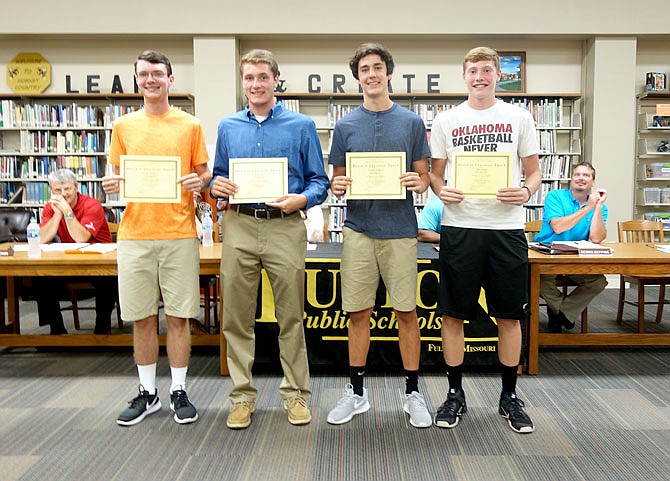 Members of the Fulton High School varsity tennis team were recognized at Wednesday's Board of Education meeting, including, from left Haydon Windsor, Justin Adams, Garrett Johnson and John Adams. Windsor and Adams were also FBLA presenters that evening.